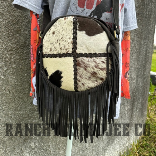 ROUND COWHIDE HANDBAG